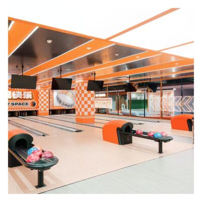 Bowling ball return for amusement bowling centers