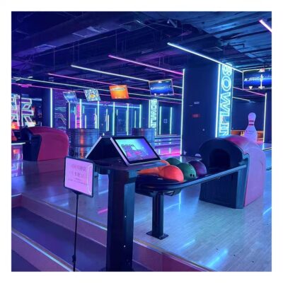 Bowling ball return for amusement bowling centers